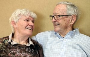 Vivian and Woody Haines smile at each other during a medical appointment.