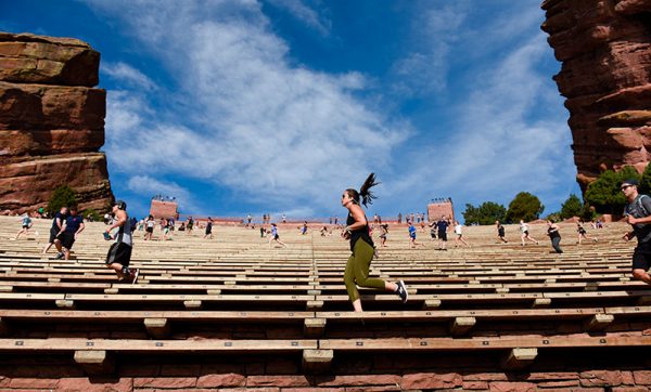 A woman runs at Red Rocks.